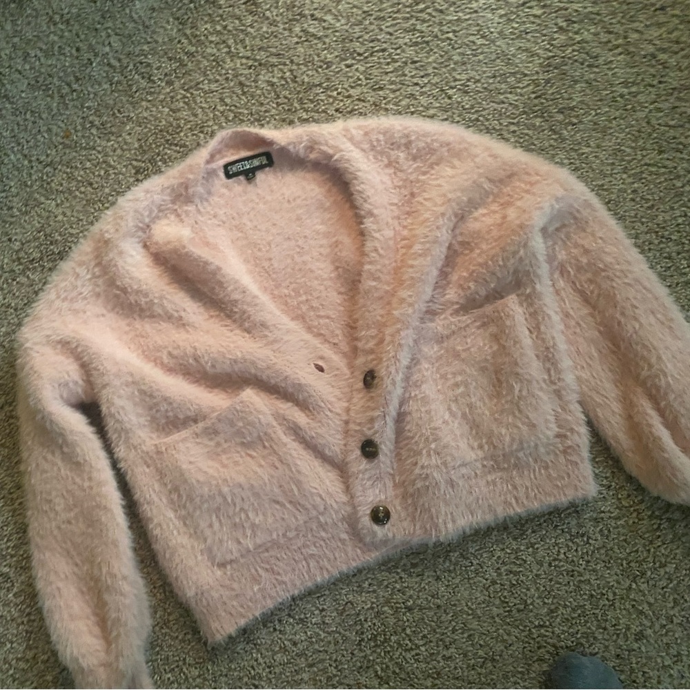 fluffy pink sweater